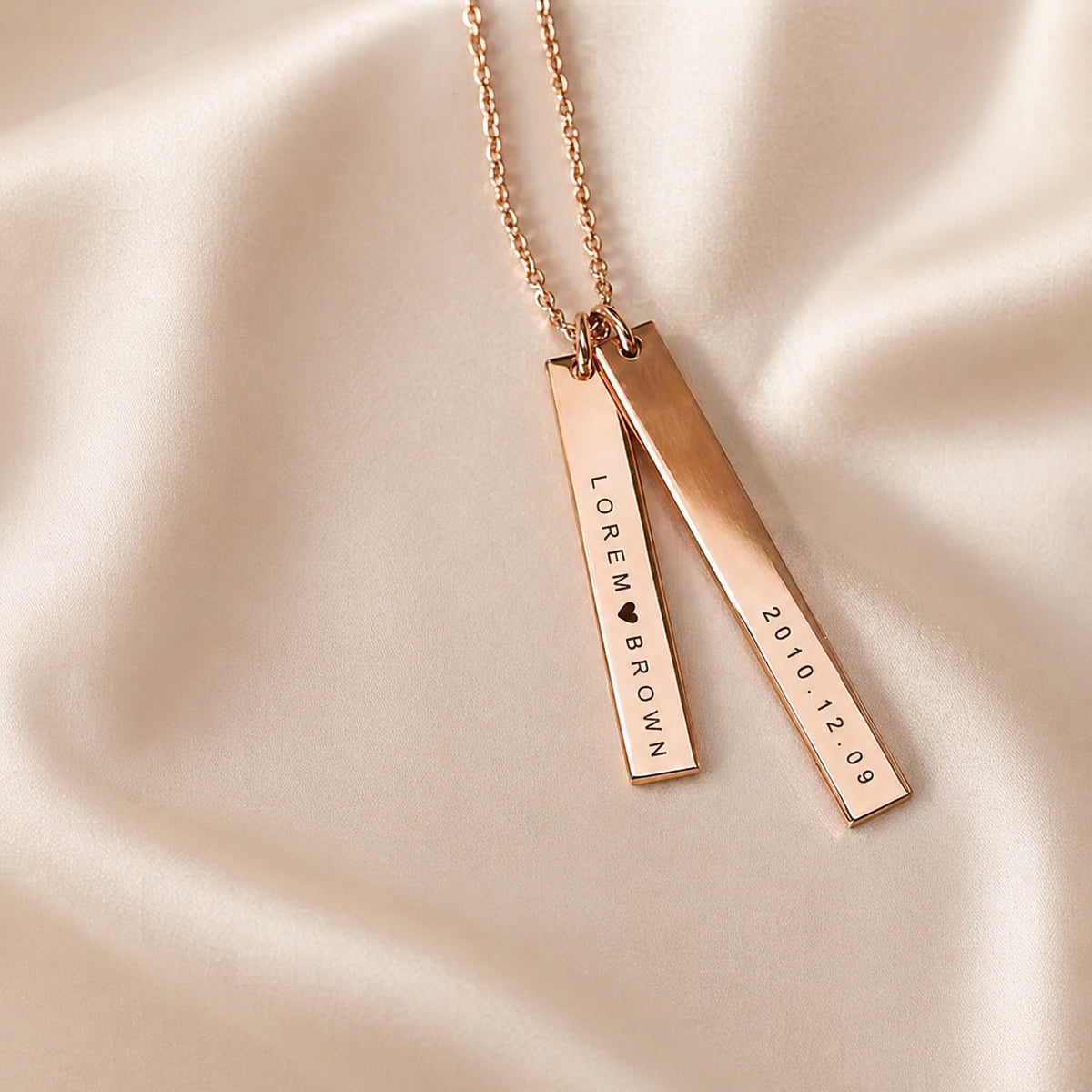 Personalized engraved bar necklace with two vertical pendants on satin