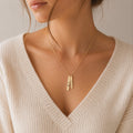Personalized engraved double bar necklace worn in gold finish