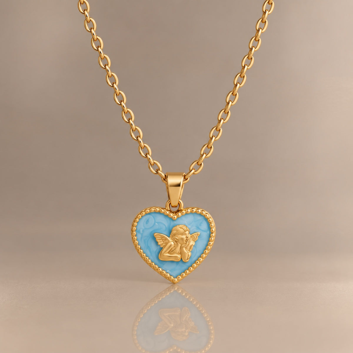 The Angel Heart Necklace – Baby Blue & Gold, studio product photo