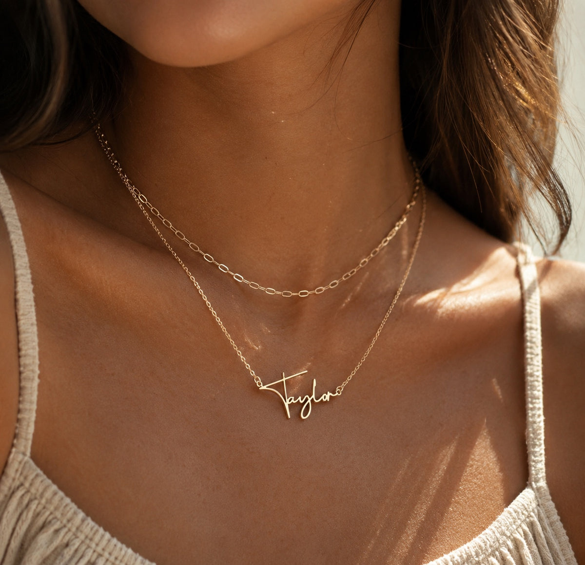 Taylor personalized name necklace worn in 18K gold plated sterling silver 925