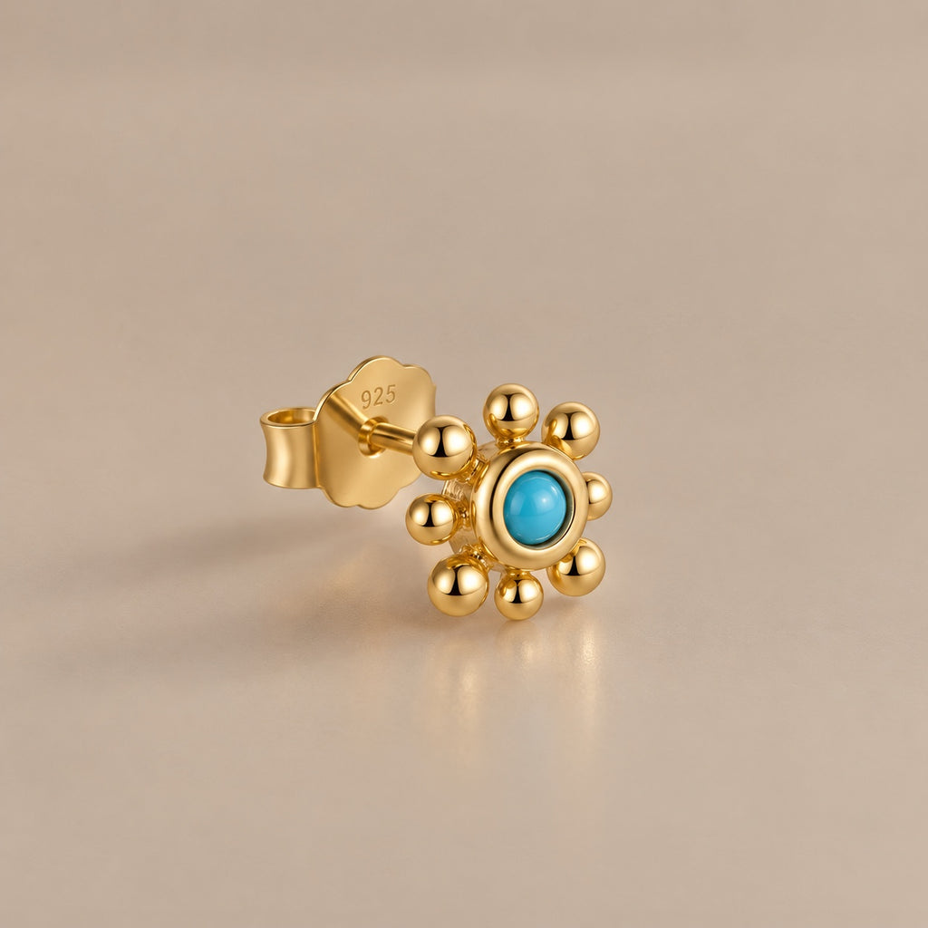 Turquoise flower stud studio view