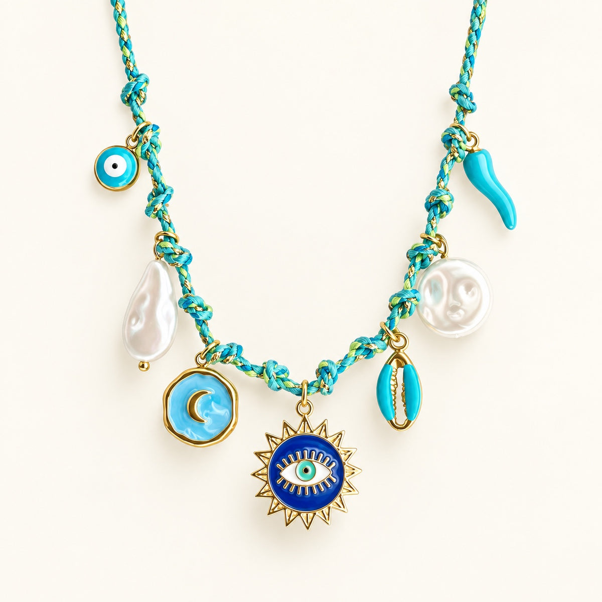 Collier Blue Eye turquoise et doré en présentation produit