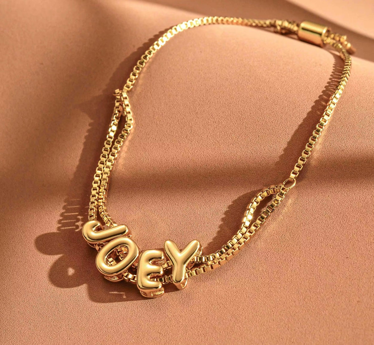 The Bubbly personalized bubble name bracelet in gold