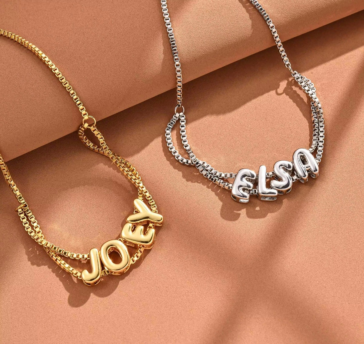 The Bubbly personalized bubble name bracelet in gold and silver