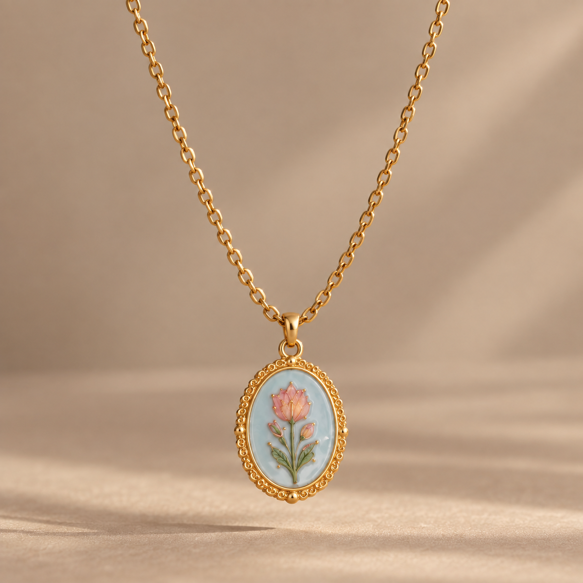 The Fleurie Hand-Painted Medallion Necklace – Blue Tulip, suspended product photo