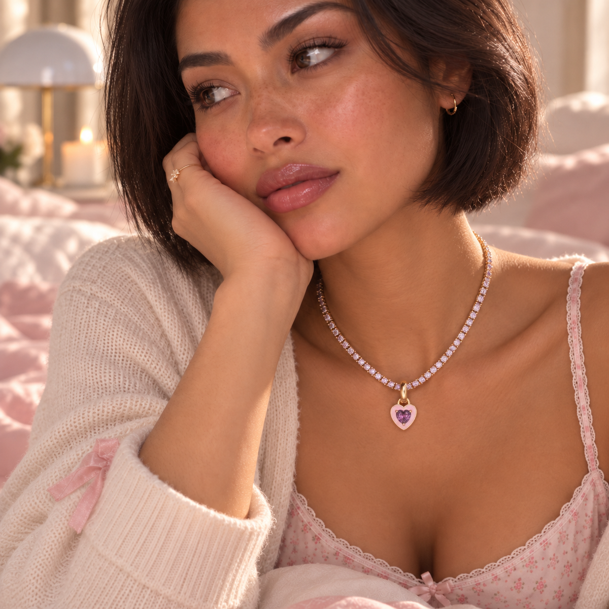 Love Spell tennis heart necklace in lavender and pink worn by model