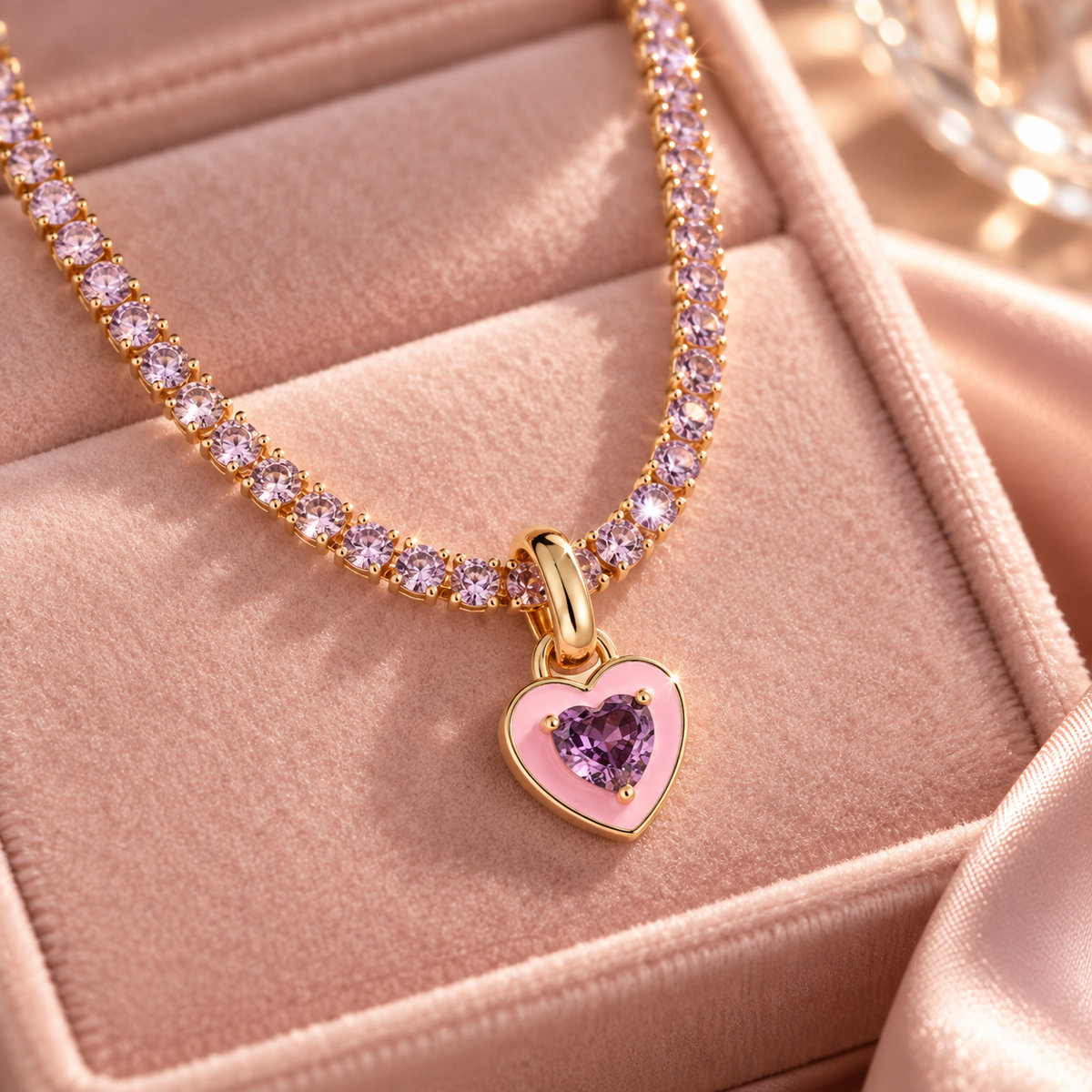 Lavender tennis necklace with pink heart pendant on blush velvet