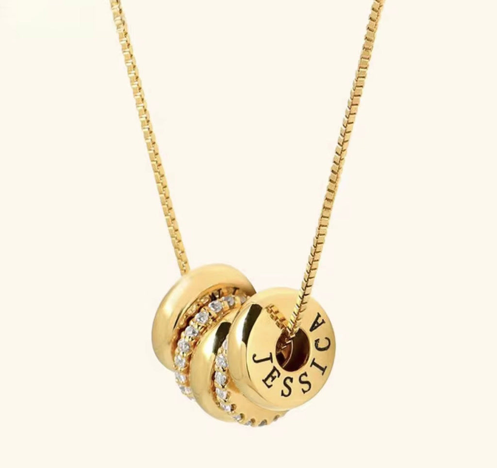 The Lyra gold engraved name bead necklace with crystal spacers
