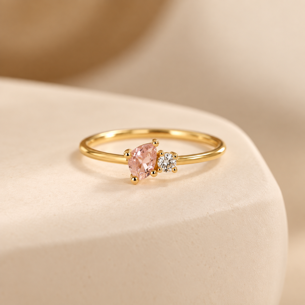 Close-up of Mama & Baby birthstone ring in gold