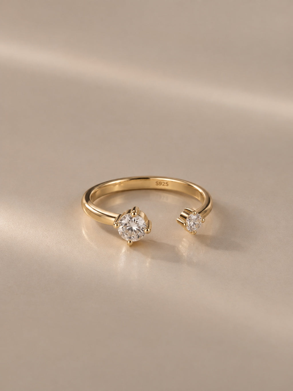 Lumi Two-Stone Ring in gold – studio front view