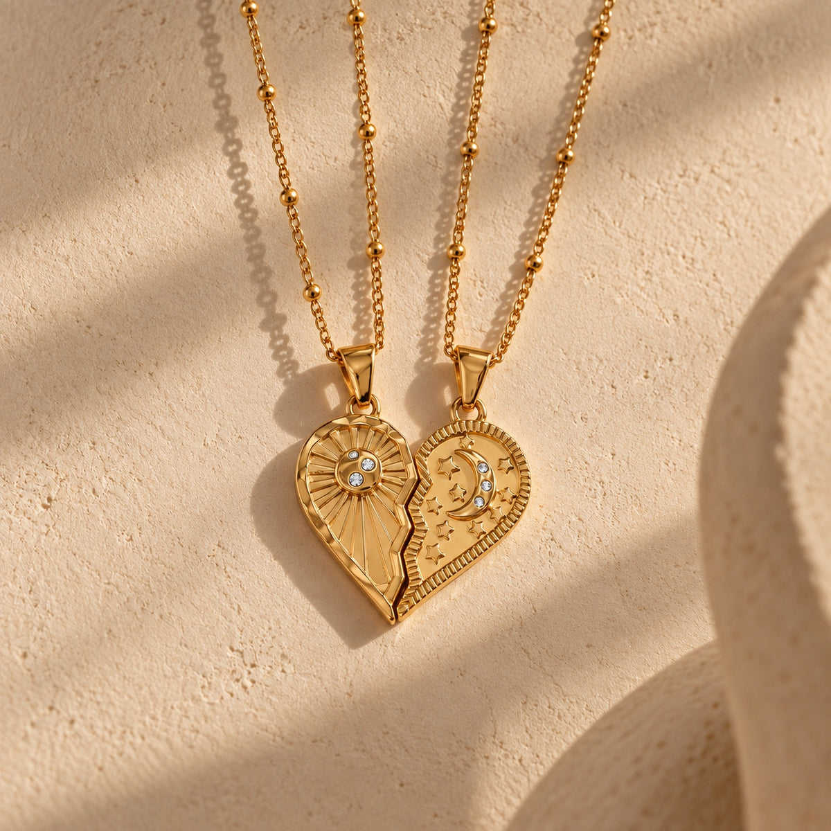 The Solstice Heart Duo necklace set - warm editorial product photo