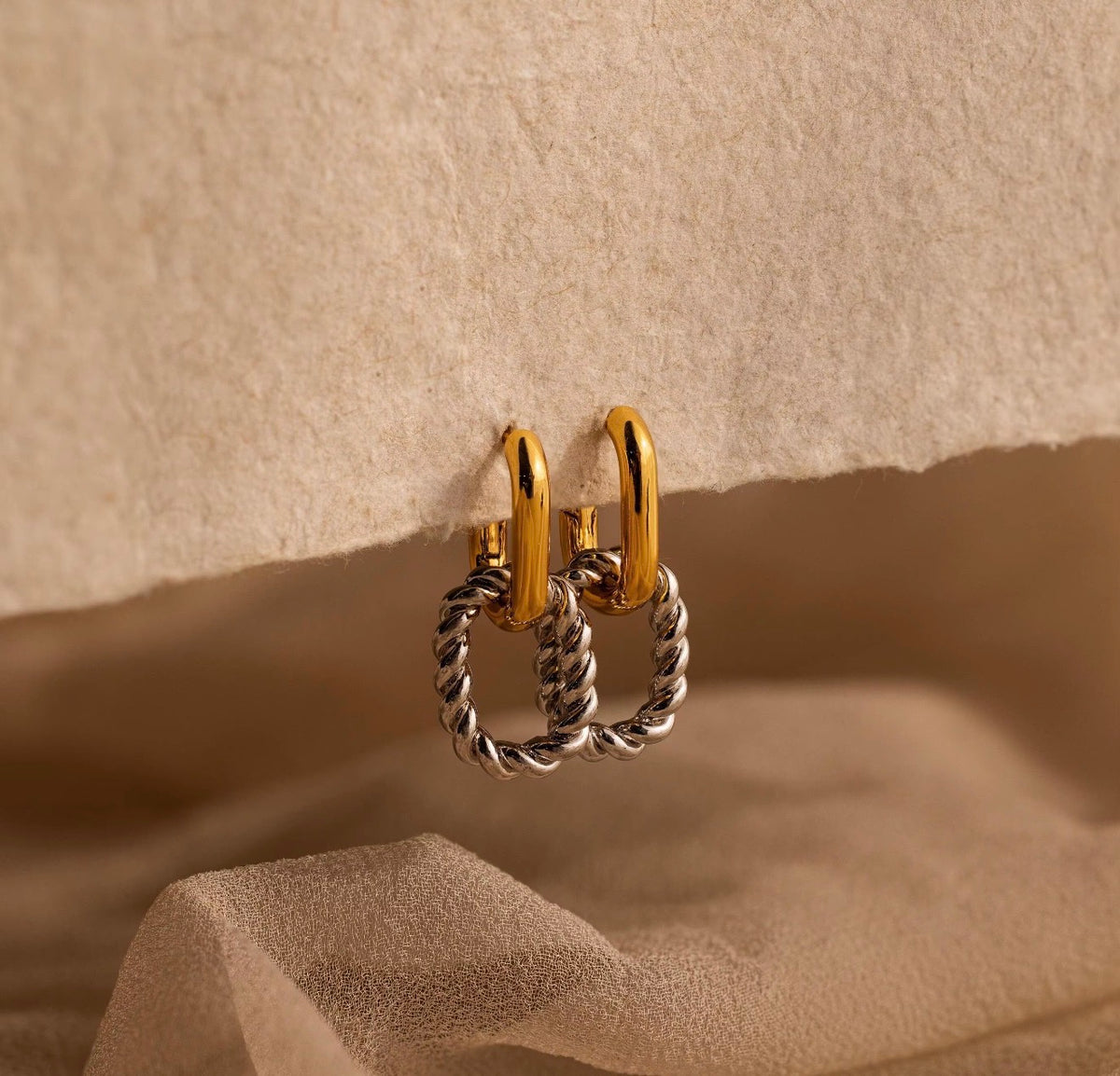 Two-tone gold and silver twisted link hoop earrings