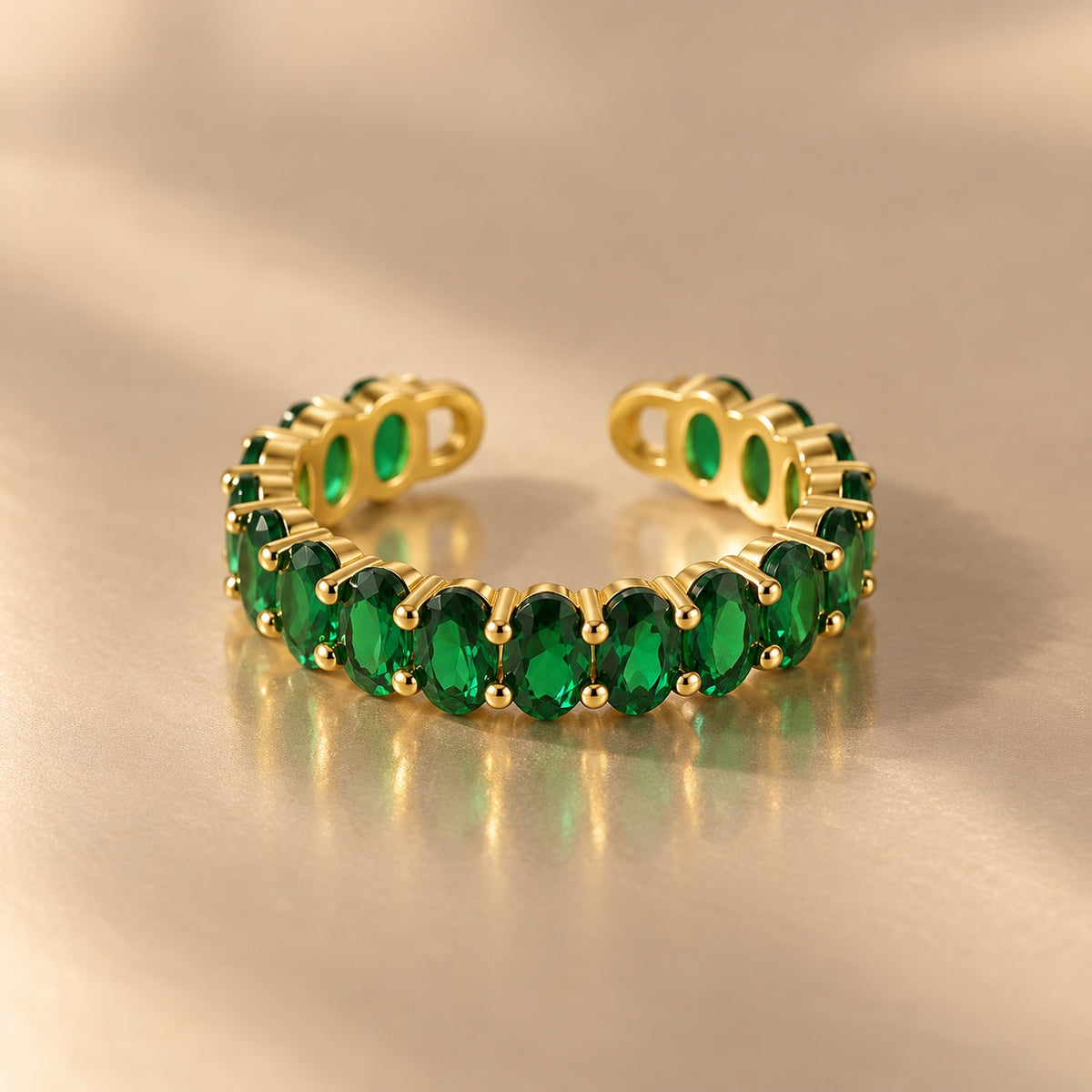 Gemline green oval zircon ring on beige background