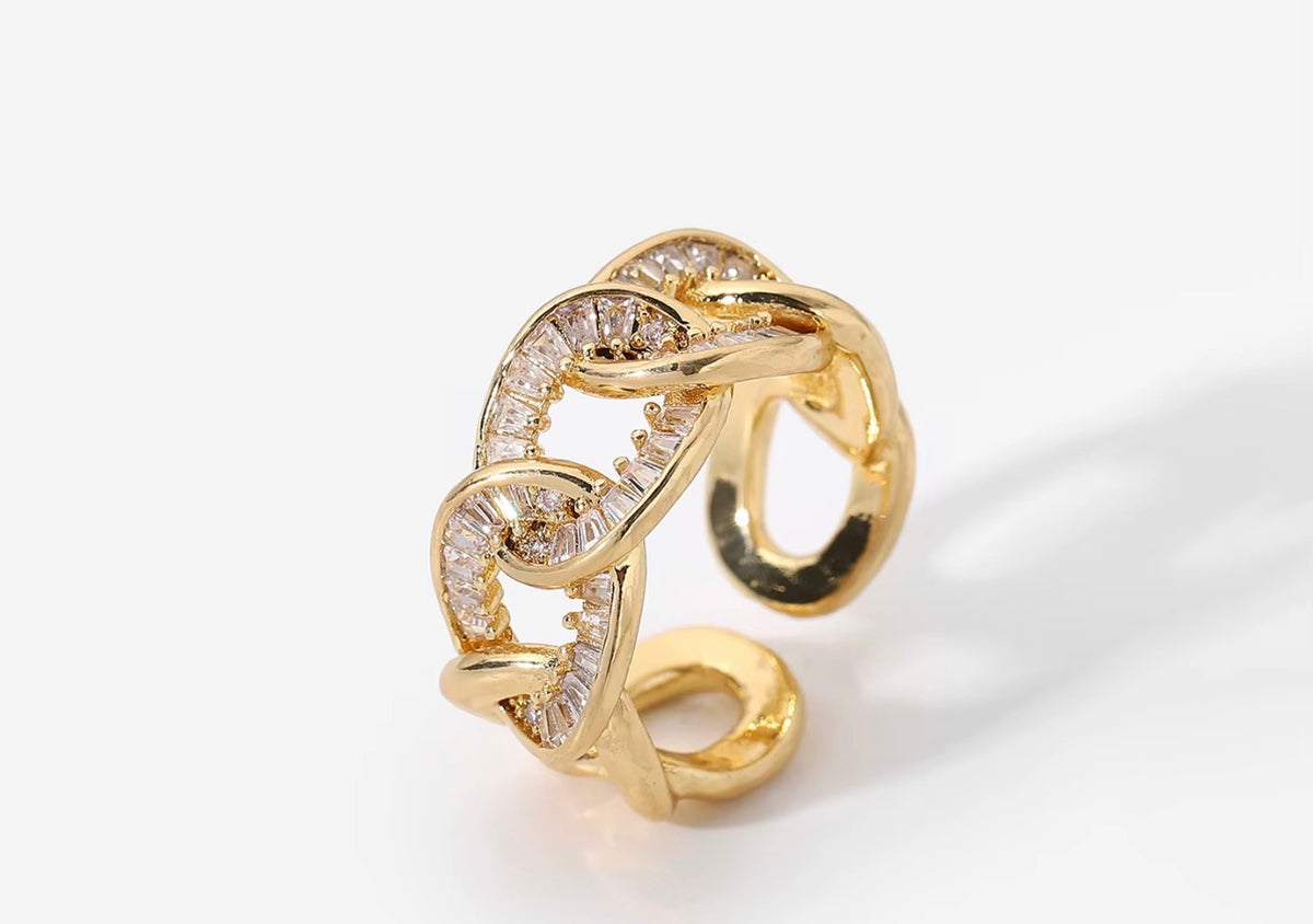 Gold Infinity Twist Ring with clear zircon stones